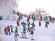 Skiers and Riders on Lower Bunny Buster at Killington, November 19, 2005