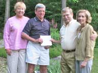 Innkeepers Bill Vines and Mary Furlong (right) of the Birch Ridge Inn at Killington give 