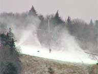 =Lone skier poaching a run under the snow guns on Rime with dog, Saturday December 2, around Noon.