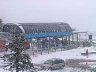 K1 Gondola station in the falling snow.