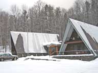 =Birch Ridge Inn covered in light snow.