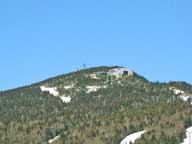 Killington Peak from top of Bear Mountain against a beautiful blue sky.