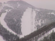 Light Snow continues to fall on Killington Peak