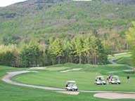 Golfers on the 8th hole on the Green Mountain National Golf Coure at Killington playing in the Thursday Night Scramble