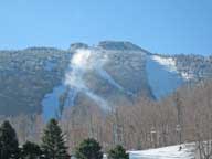 =Snowmaking operations create blizzard like conditions on Cascade off Killington Peak.