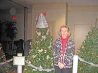 Mary with the christmas tree donated by the Birch Ridge Inn to the Vermont Holiday Festival.  The theme of the tree is 'Just Heavenly