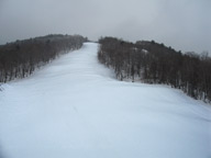 Highline from the K1 Gondola. The shadows are the back sides of snowmaking whales left from newly blown snow. Click to enlarge.