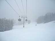 Larry on Cascade with heavy snow falling.