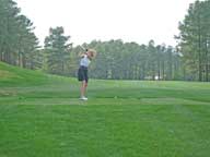 Mary hitting a tee shot on Legacy