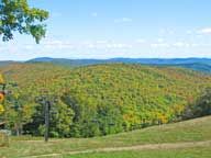 =Fall colors on display looking east from Highroad trail at Killington Ski Resort