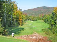 Howie walking to the white tees on the 16th hole at Green Mountain National