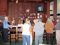 Crowd gathers in Great Room at Birch Ridge Inn to watch VP debate.