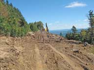 Picture from an earlier hike of drilling equipment used to place charges to blast away at Sky Peak. Direction is looking from junction of Great Eastern and Gateway towards Sky Peak Quad.