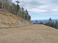 Finished product, ready for snow and skiers.  Mount Washington in the White Mountains is in the distance.