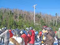 The queue at the North Ridge Triple.  Notice the high concentration of helmets.