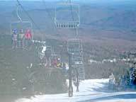 Full North Ridge Triple.  Even full, the pace of the chair leaves from plenty of empty space on the trails.