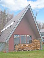 Neatly stacked wood pile at the Birch Ridge Inn