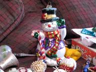 Snowman Christmas ornament waiting to be hung on the Birch Ridge Inn Christmas Tree