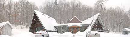 Birch Ridge Inn covered in new snow.