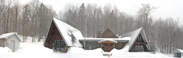 Heavy snow falling around the Birch Ridge Inn at Killington