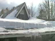 Snow removal from back roof of Birch Ridge Inn