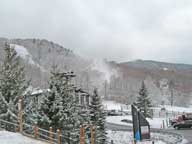 Snow Guns still blowing snow on trails at K1 Base Lodge