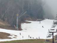 Skiers and riders at the junction of Chute and Mousetrap at Killington.
