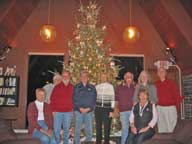 The Christmas Tree at the Birch Ridge Inn. From Left. Noel, Connie, Howie, Dick, Mary, Billy B., Charlotte, Carolyn(seated) and George.