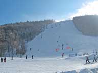 Skiers and riders enjoying Superstar in the sunshine on Saturday of MLK weekend.