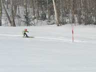 KMS student going around a gate on Skye Burst during race training.