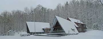 Birch Ridge Inn covered in spring snow.