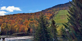 Snowshed Pond surrounded by color.