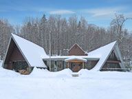 The Birch Ridge Inn at Killington.  It is not snow covered like this today... but it will be real soon...