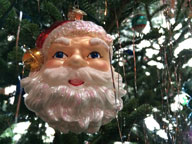 Santa looking over the Great Room from the Birch Ridge Inn Christmas Tree.