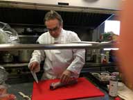 Chef Craig Cornell prepping a pork tenderloin for tonights staff training session