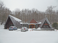 Snow covering the Birch Ridge Inn at Killington